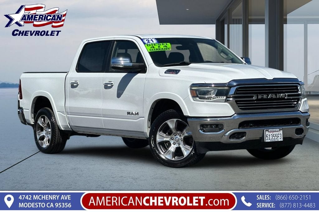 2021 RAM 1500 Laramie in Bright White Cl — front three-quarter view