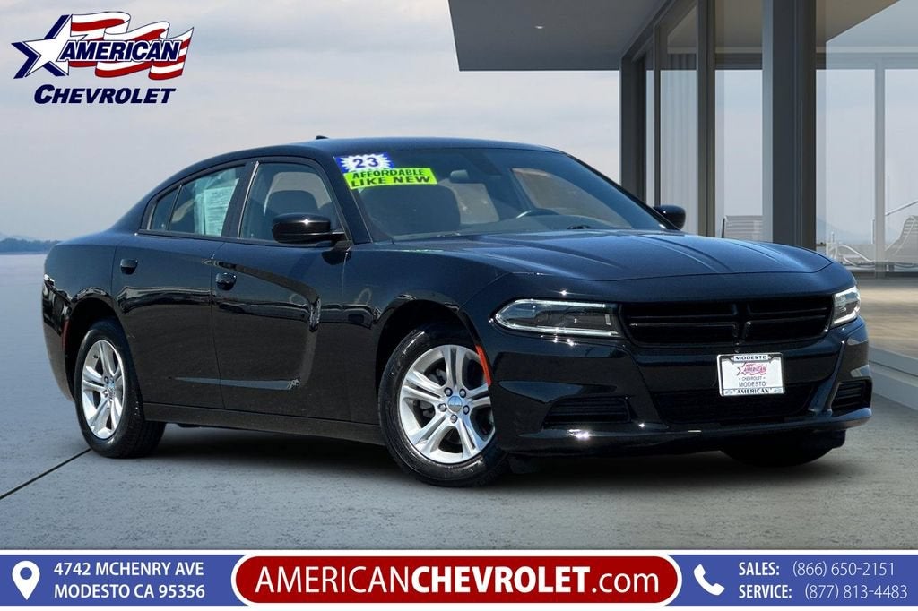 2023 Dodge Charger SXT in Pitch Black Cle — front three-quarter view