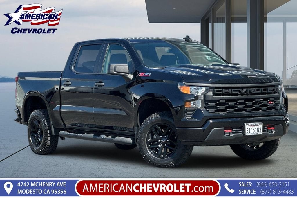 2022 Chevrolet Silverado 1500 Custom Trail Boss in Black — front three-quarter view