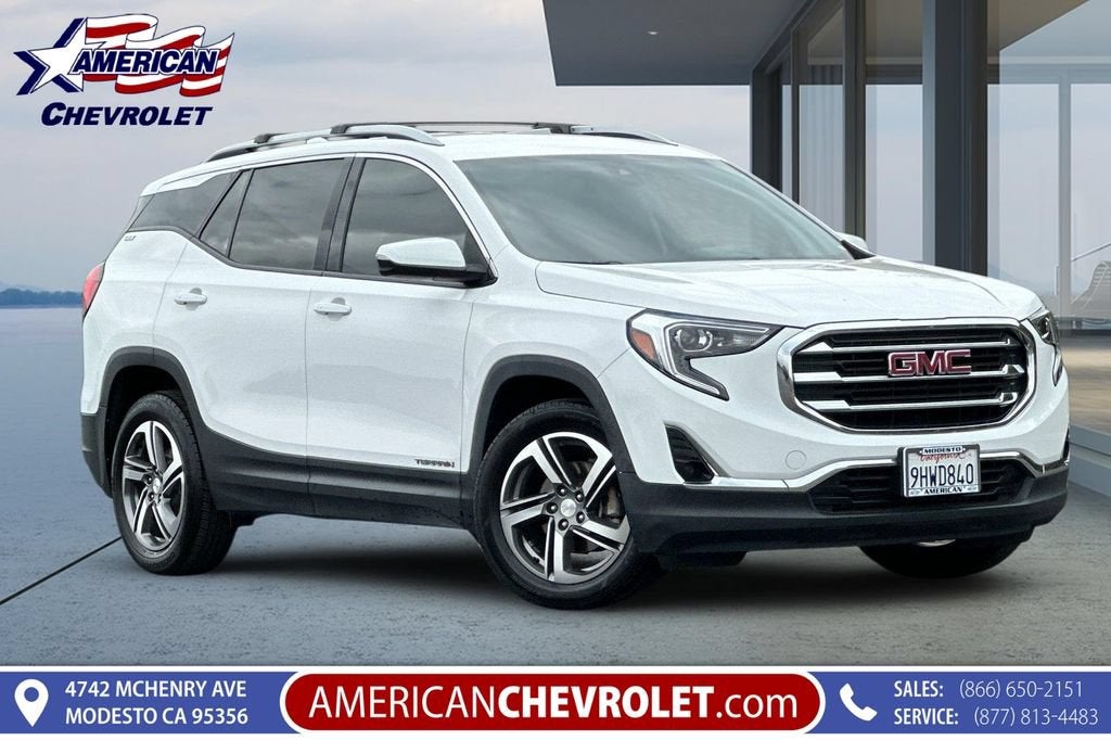 2021 GMC Terrain SLT in Summit White — front three-quarter view