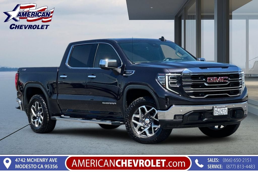 2023 GMC Sierra 1500 SLT in Titanium Rush Metallic — front three-quarter view