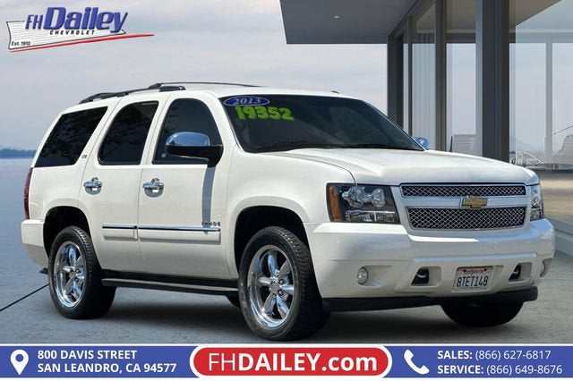 2013 Chevrolet Tahoe LTZ in White Diamond Tricoat — front three-quarter view