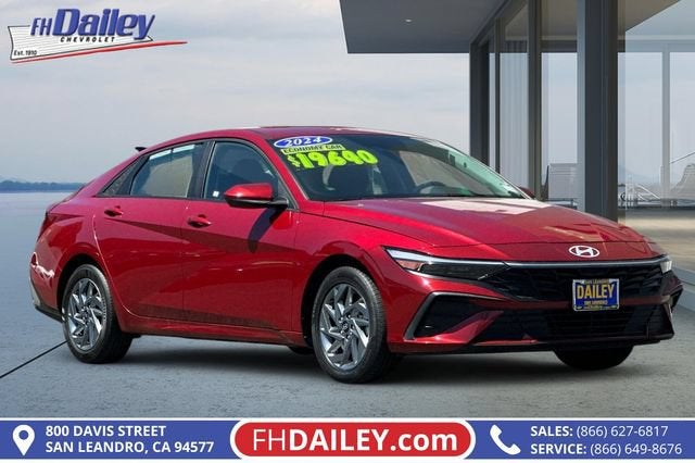 2024 Hyundai Elantra SEL in Ultimate Red — front three-quarter view